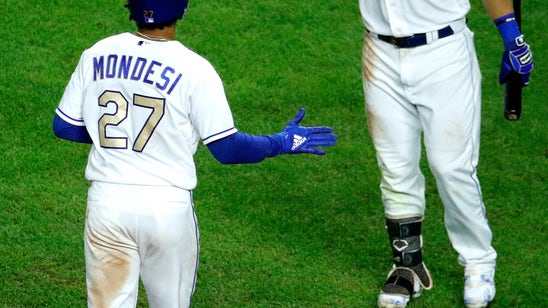 Perez hits game-ending slam as Royals beat Twins 8-4