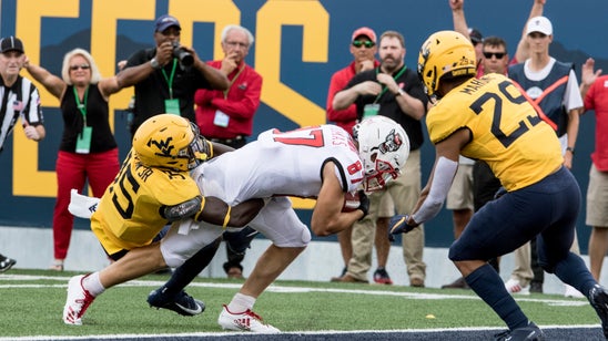 Kendall throws 3 TDs, West Virginia beats NC State 44-27