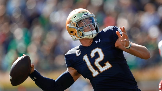 Book throws for 5 TDs as No. 7 Notre Dame routs New Mexico