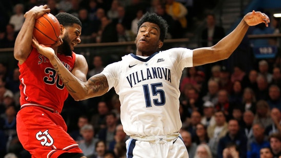 Booth rallies champion Wildcats past No. 24 St. John’s