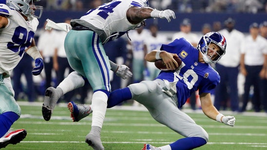 Eli Manning under siege in Giants' loss to Cowboys