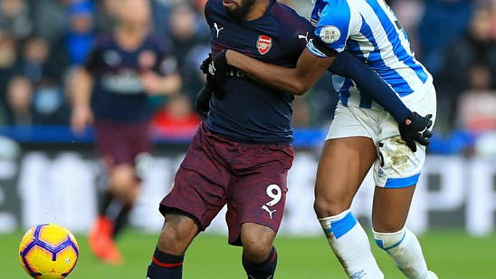 Arsenal beats Huddersfield 2-1 in English Premier League