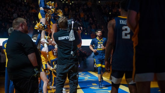 West Virginia dismisses Ahmad, Harris for rule violations
