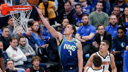 Jokic scores 33 to lead Nuggets past Mavericks 107-106
