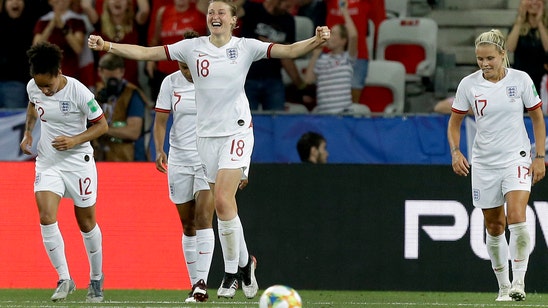 England beats Japan 2-0 to clinch top spot in Group D