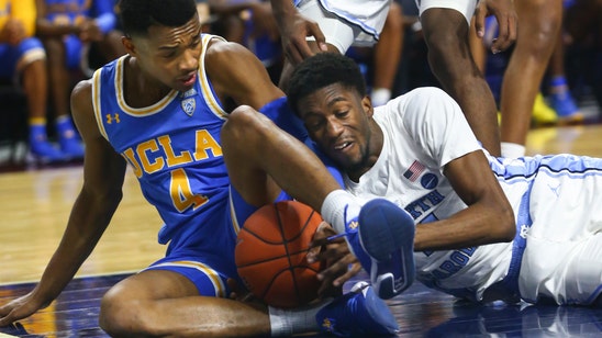 Hunter, No. 4 Virginia survive No. 25 Wisconsin in Bahamas