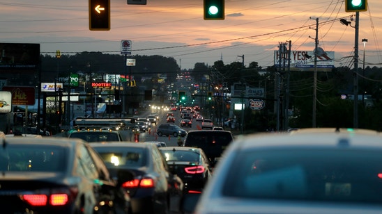 Outside Masters, Washington Road bustles in its tacky glory