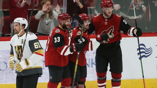 Garland scores twice, Coyotes top Vegas 4-1 for 1st win