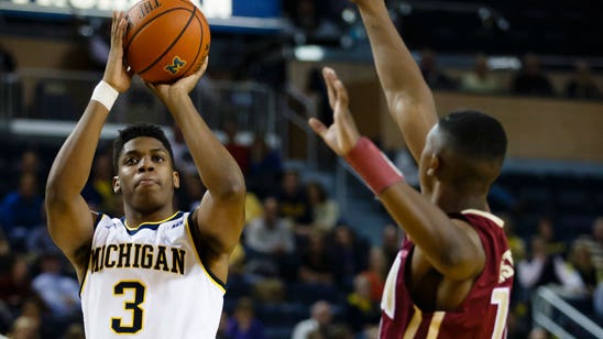 Michigan's Chatman receives release, plans to transfer