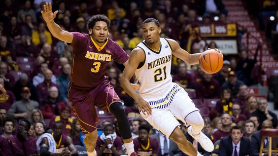 Walton, Michigan hang on to beat Minnesota 82-74
