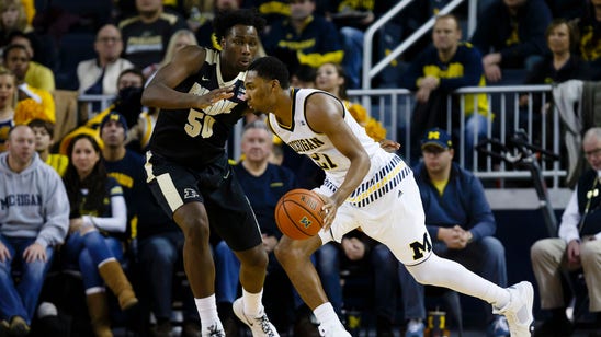 Michigan scores final 11 points to beat No. 18 Purdue 61-56