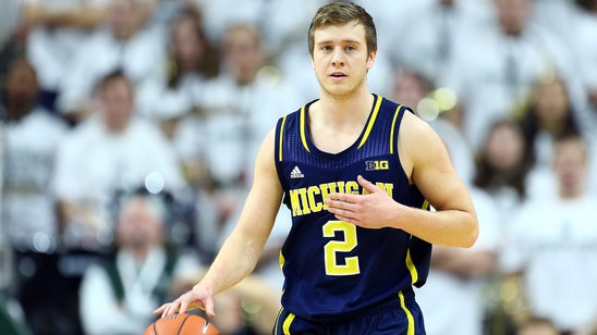 Michigan lifts transfer restrictions for Doyle, Albrecht