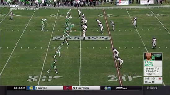 North Texas running back causes his quarterback to miss snap by vomiting next to him