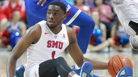 Watch: SMU's Shake Milton keeps his dribble while on the ground to set up alley-oop