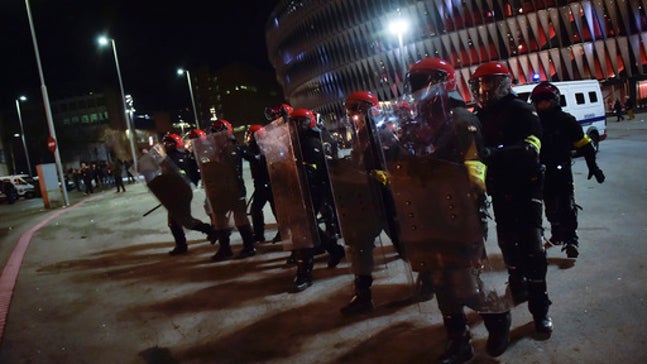 Police say officer collapsed by himself during fan violence