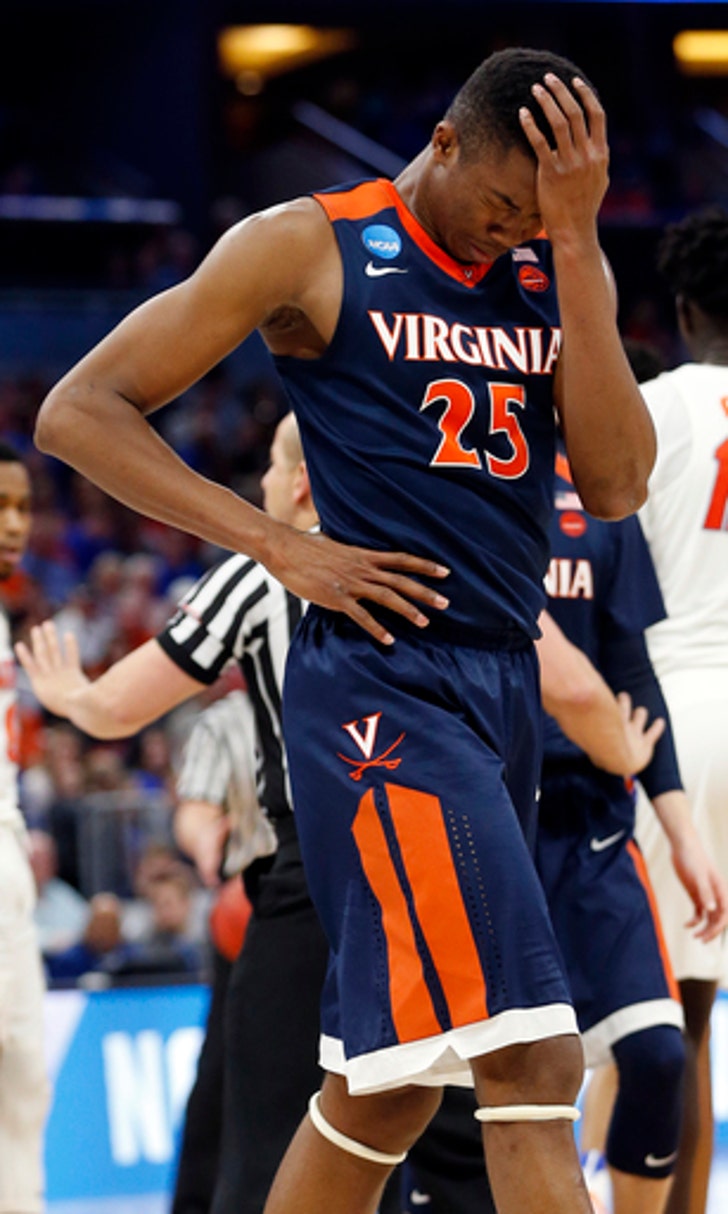 Leon, Robinson shine, Florida routs Virginia 6539 in NCAAs (Mar 18