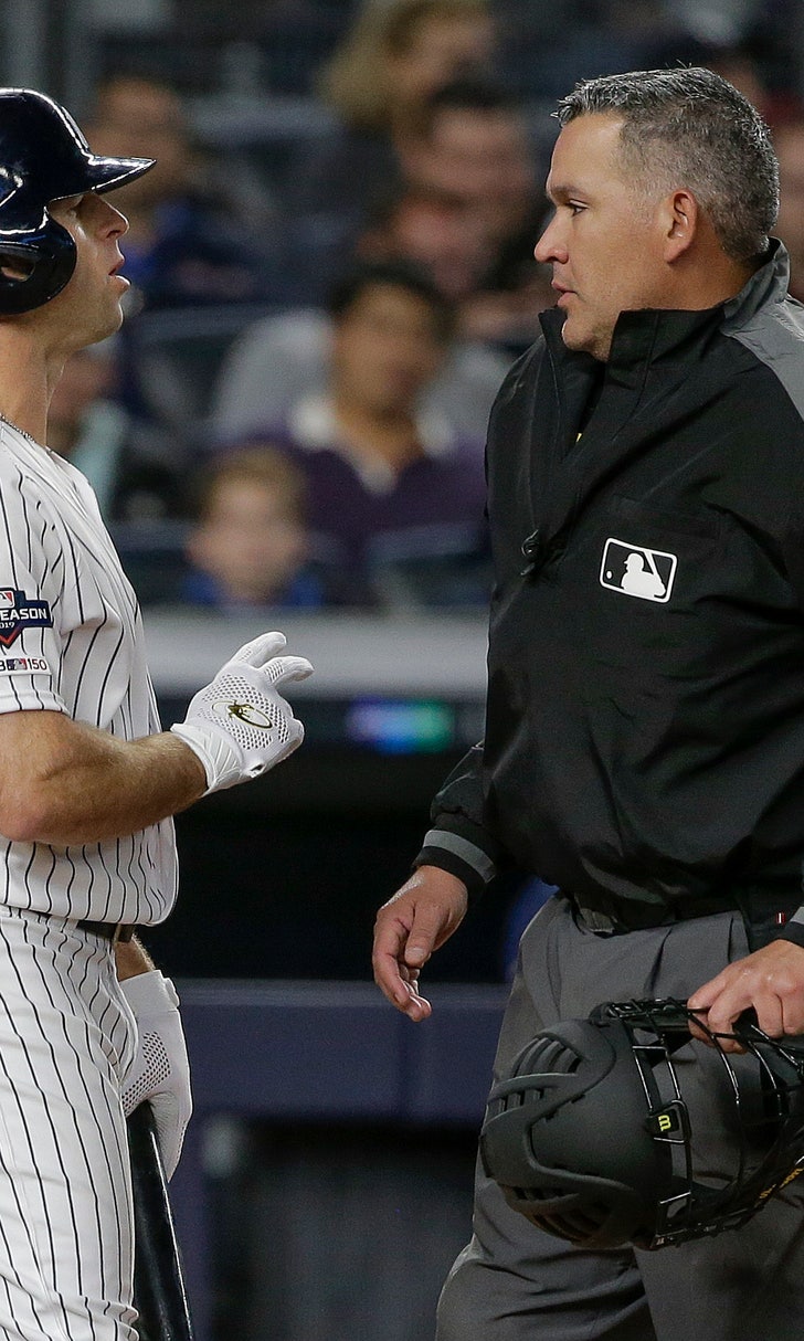 pic of mlb ump lopking at tv screen replay pic of mlb ump lopking at tv screen replay