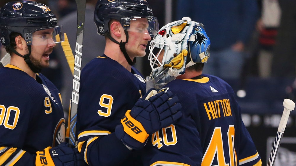 McDavid scores 2, Oilers beat Flames 8-3 as goalies fight