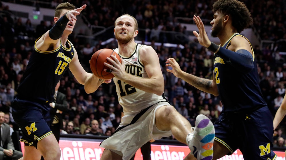 Michigan extends winning streak with rare victory at Purdue