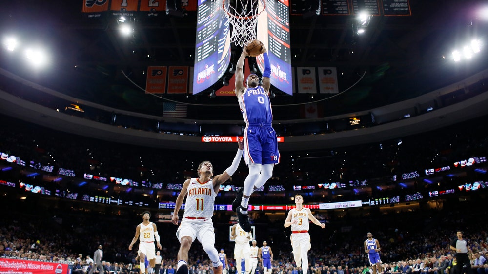 Embiid scores career-high 49, 76ers beat Hawks 129-112