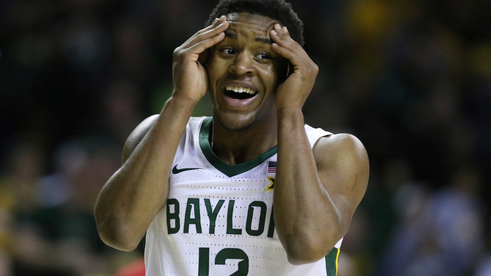 No. 1 Baylor tops No. 14 W Virginia 70-59, ties Big 12 mark