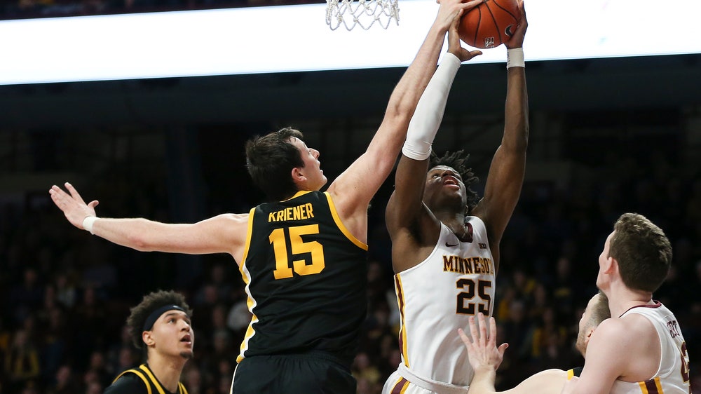 Garza scores 24 points; No. 21 Iowa beats Minnesota 58-55