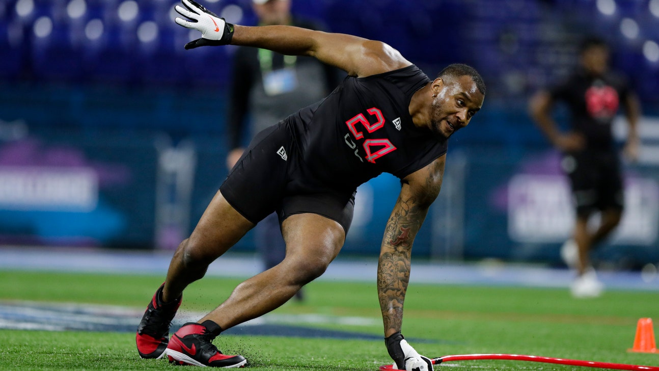 Needing blockers for Tagovailoa, Dolphins draft Hunt