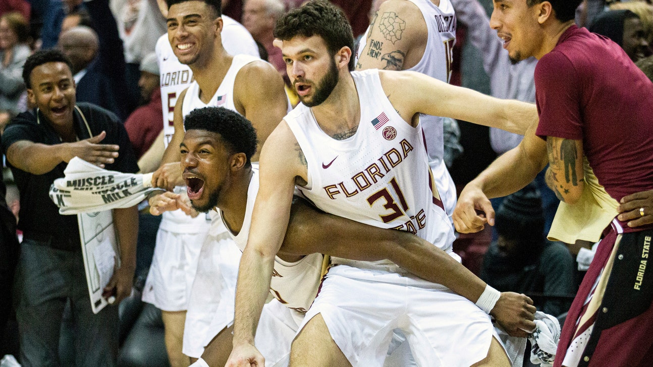 Aubuike, No. 1 Kansas avoid letdown, rout Oklahoma State