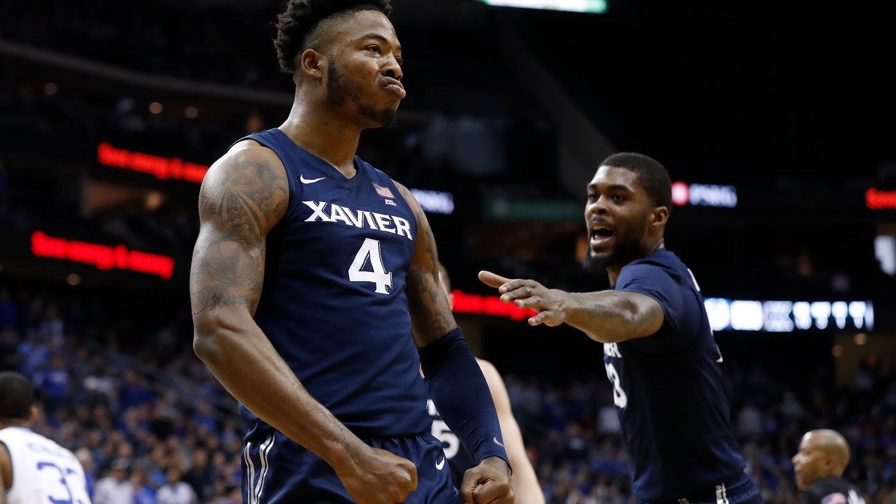 Jones leads Xavier over No. 10 Seton Hall, win streak ends.