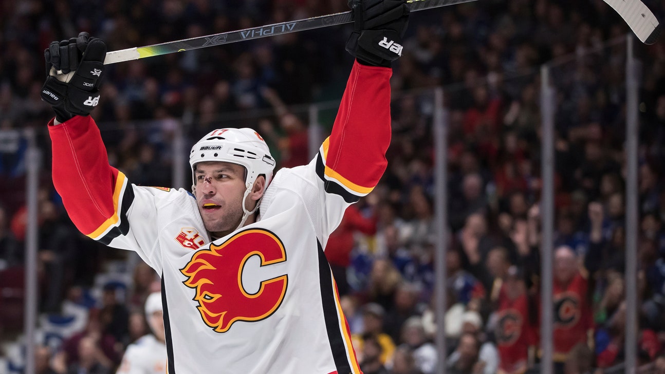 Dube has goal, 2 assists as Flames beat Canucks 6-2