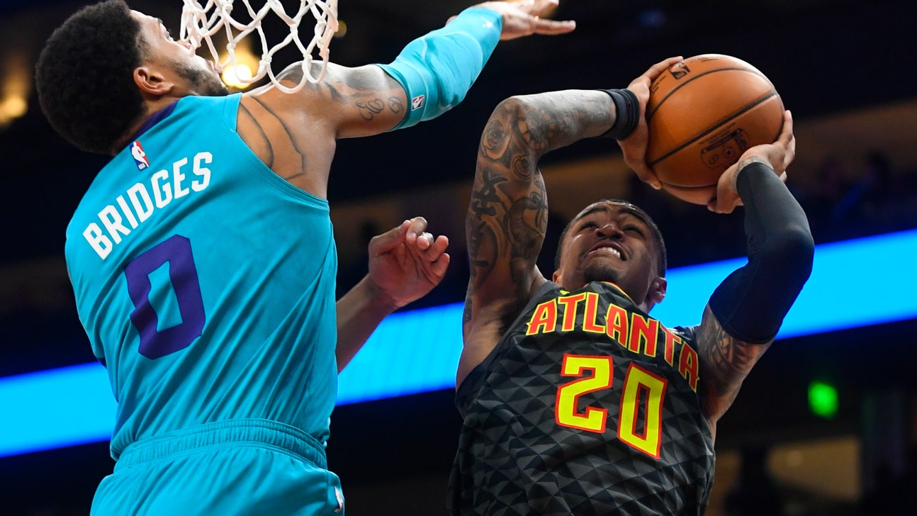 Young has 31 as Hawks outlast Hornets 143-138 in double-OT
