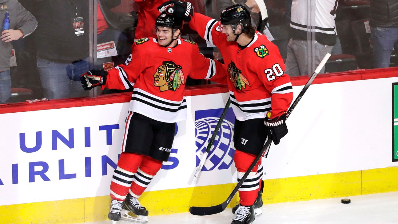 DeBrincat scores twice, rallies Blackhawks past Preds in OT