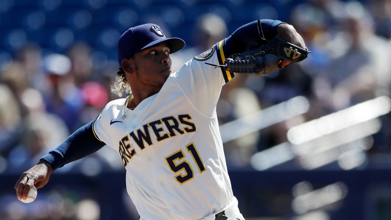 Peralta opts for security in $15.5M deal with Brewers