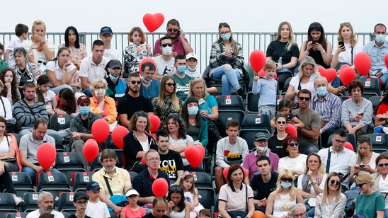 Djokovic defends packed stands at tennis charity tour event