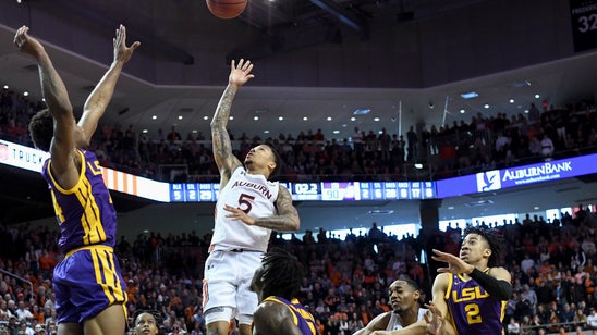 McCormick's OT basket lifts No. 11 Auburn past No. 18 LSU