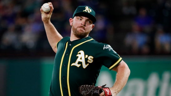 A's Liam Hendriks helps fire victims back home in Australia