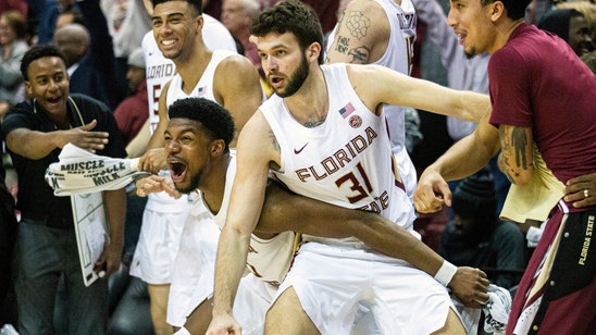 Aubuike, No. 1 Kansas avoid letdown, rout Oklahoma State