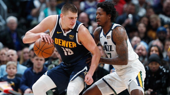 Nikola Jokic carries short-handed Nuggets past Jazz 106-100