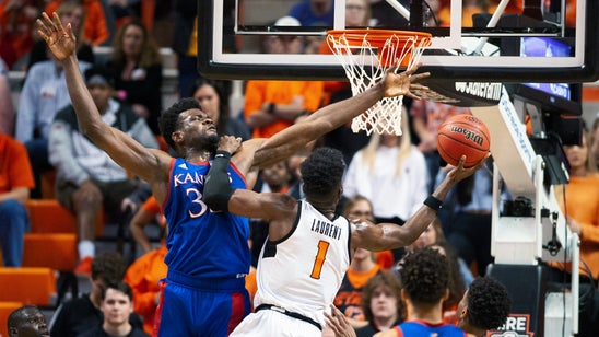 Freshman Braun leads short-handed Kansas past Oklahoma State