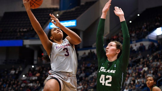 UConn wins share of AAC title with 74-31 rout of Tulane
