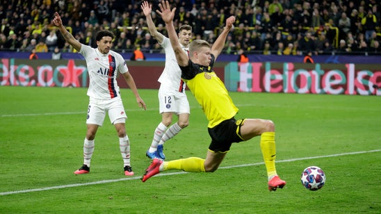 Haaland nets 2 to give Dortmund 2-1 win over PSG in CL