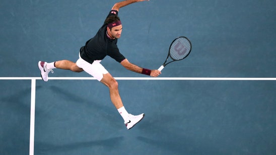 Federer tops Australia's Millman in 5 sets at Melbourne Park