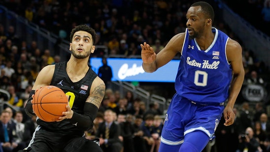 Powell leads No. 13 Seton Hall past Marquette 88-79