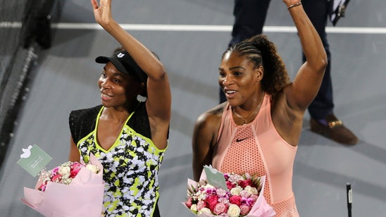 Stretch it out: Serena, Venus Williams offer fans yoga tips