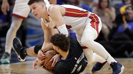 Butler, Herro lead Heat past Magic, 102-89