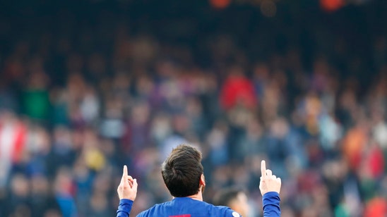 Barcelona takes over Spanish league lead after Madrid loss