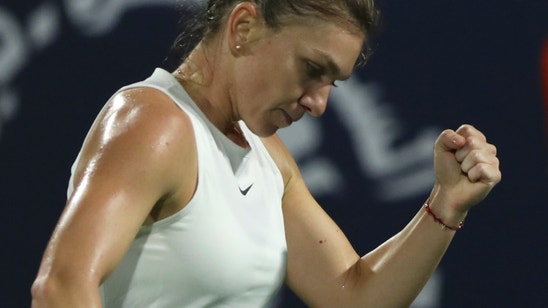 Halep wins Dubai tiebreaker to secure 20th title
