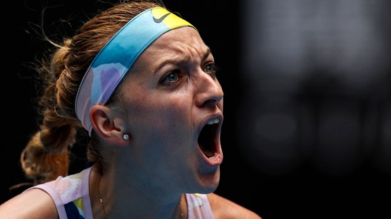 The Latest: Federer rallies to reach Australian Open QFs