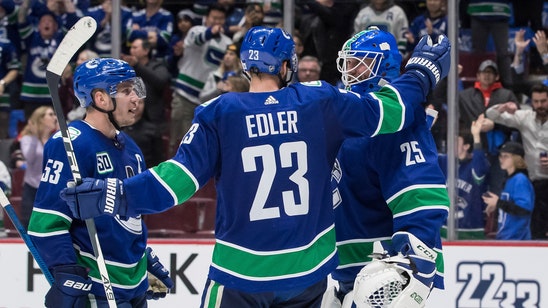 Markstrom stops 49 shots, Canucks blank Blackhawks 3-0