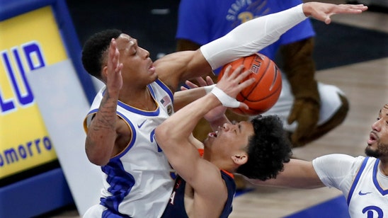 Kihei Clark scores 17 as Virginia holds off Pitt 59-56